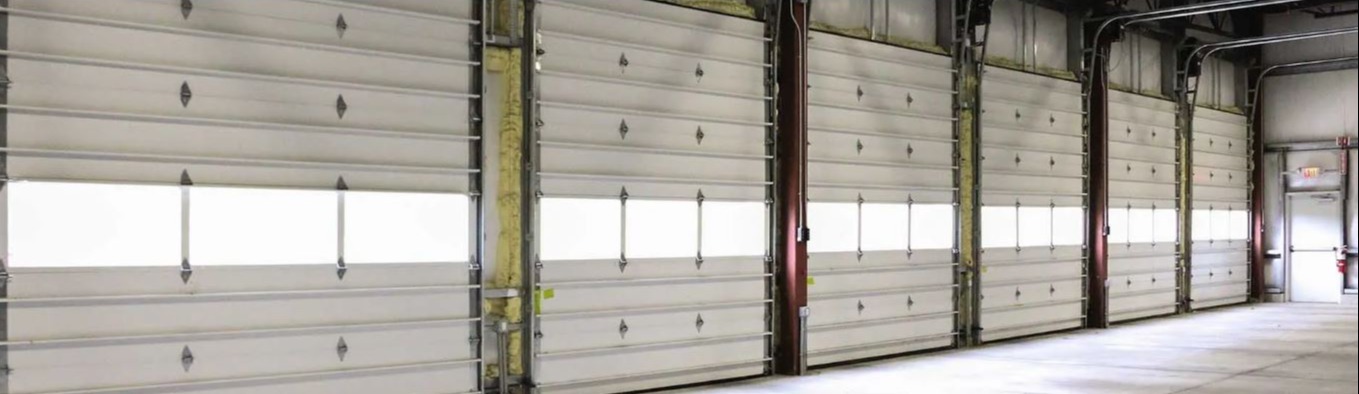 Internal warehouse view of multiple commercial doors