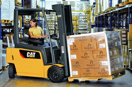 CAT Electric Forklift lifting pallet