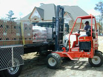 Man operating forklift