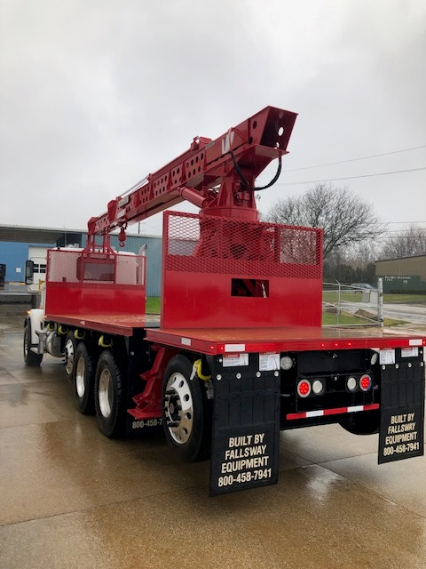 feature picture of Freightliner 122SD with rebuilt USTC 110-35E block unloader