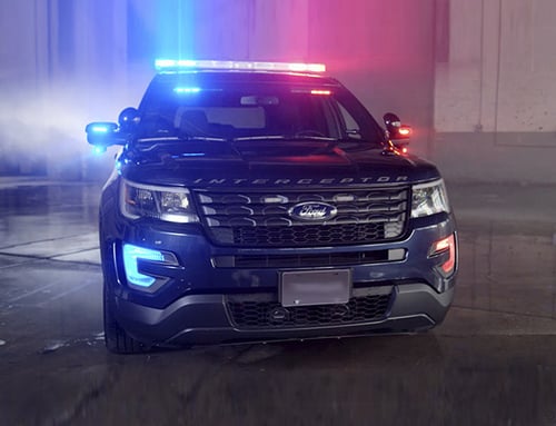 Front view of police car with lights on