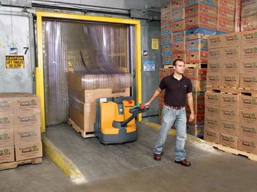 Unloading with EJE 120/120E Walkie Pallet Trucks