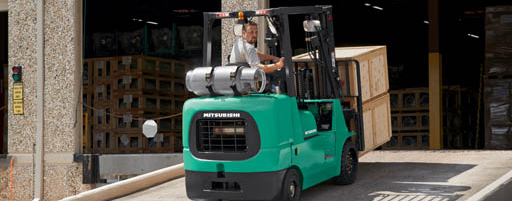 Man operating forklift